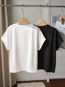 SHEIN Bộ 2 áo thun tay ngắn cổ tròn dáng suông cho bé gái, chất liệu vải dệt kim mềm mại và co giãn, lý tưởng cho các hoạt động ngoài trời, đi làm và thư giãn, thích hợp cho mùa xuân/hè. - Đen và trắng - Xem 2