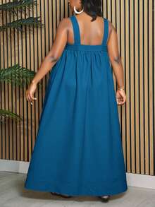 Slaydiva Bộ sưu tập thời trang nữ cỡ lớn mùa xuân/hè 2025 mới, thích hợp cho mùa thu/trở lại trường học/bắt đầu năm học/năm học mới/công sở/văn phòng/ngoài trời/sân bay/lễ tốt nghiệp/kỳ nghỉ thanh lịch/phong cách đường phố. Váy dài dáng suông kaki rộng rãi có dây đeo và túi, cỡ lớn, kiểu dáng xòe. - Màu xanh lam - Xem 2