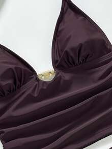 Bonvoyette Bộ đồ bơi nữ 2 mảnh gồm áo tankini, áo ngực tích hợp nâng ngực, áo croptop kiểu dáng thể thao và chân váy màu nâu cổ điển. Bộ đồ hai mảnh dành cho nữ thích hợp cho các buổi hẹn hò ngoài trời, tiệc bãi biển, mặc gợi cảm, tiệc cưới ngoài trời, tiệc trà chiều, lễ hội, phù hợp cho đi chơi, xem hòa nhạc, dự tiệc. - Màu đỏ tím - Xem 5