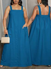 Slaydiva Bộ sưu tập thời trang nữ cỡ lớn mùa xuân/hè 2025 mới, thích hợp cho mùa thu/trở lại trường học/bắt đầu năm học/năm học mới/công sở/văn phòng/ngoài trời/sân bay/lễ tốt nghiệp/kỳ nghỉ thanh lịch/phong cách đường phố. Váy dài dáng suông kaki rộng rãi có dây đeo và túi, cỡ lớn, kiểu dáng xòe. - Màu xanh lam - Xem 1