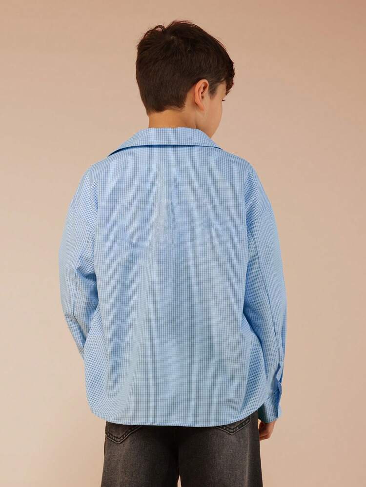 Chemise à carreaux à manches longues et col