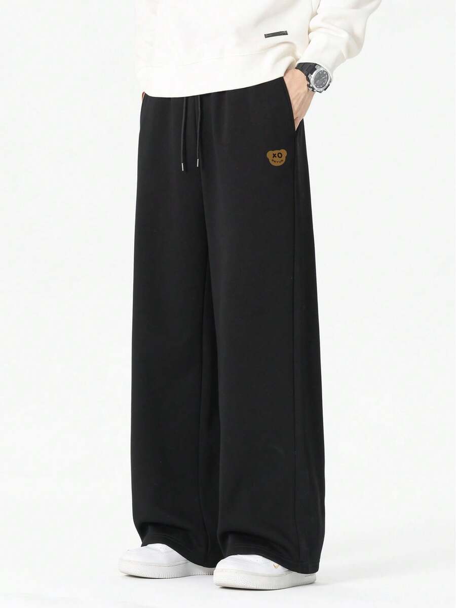 Manfinity Hypemode 男士卡通熊印花抽绳腰带口袋阔腿宽松休闲裤 - 黑色 - 查看 1