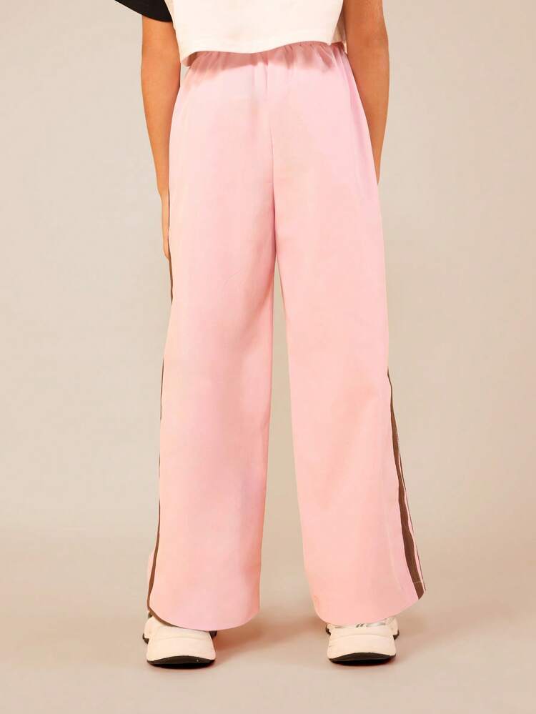 Joggers rosa con dettaglio a righe marroni
