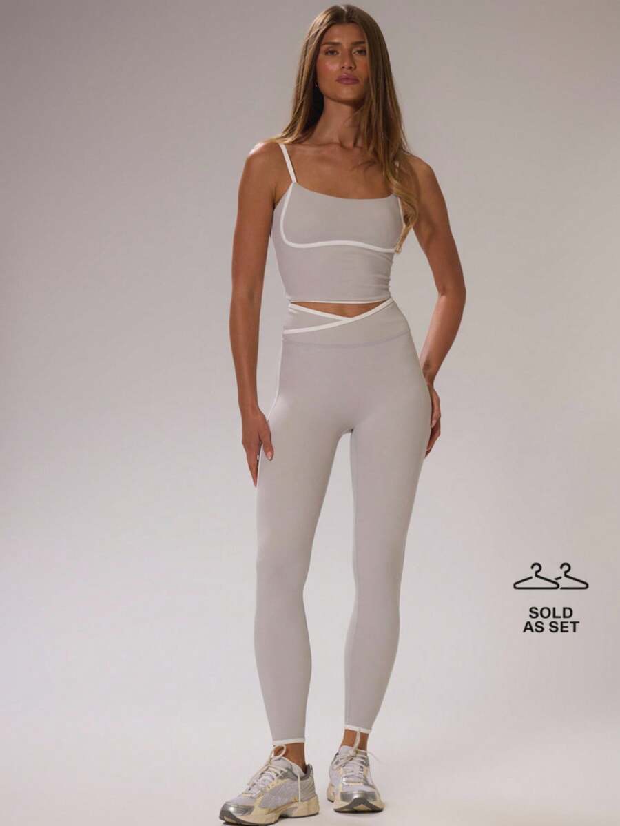 Musera Sport Bộ đồ thể thao gồm áo crop top ôm sát phối viền tương phản và quần legging cạp cao chéo, chất liệu co giãn, thích hợp cho tập luyện thể thao, trượt tuyết, thể dục, trượt tuyết địa hình, yoga, pilates, mặc hàng ngày và mùa hè. - Nhiều màu - Xem 1