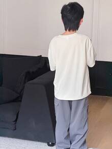 2pcs Tween Boy Loose Fit Round Neck Short Sleeve T-Shirt With Cargo Pocket & Contrast Color Pants Set, Casual, Sports, Vacation, School, Party, Fashion Versatile, Spring/Summer - White - View 2