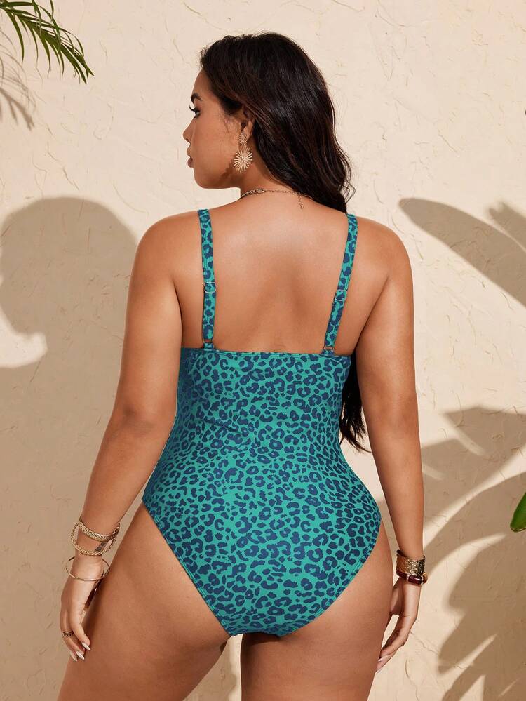 SHEIN Swim Vcay Traje de baño casual de una pieza con diseño de escote en V, lazada, diseño hueco y ajustable para mujeres de talla grande con estampado de leopardo, para vacaciones - Azul - Añade 2