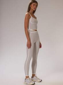 Musera Sport Bộ đồ thể thao gồm áo crop top ôm sát phối viền tương phản và quần legging cạp cao chéo, chất liệu co giãn, thích hợp cho tập luyện thể thao, trượt tuyết, thể dục, trượt tuyết địa hình, yoga, pilates, mặc hàng ngày và mùa hè. - Nhiều màu - Xem 3