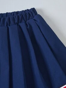 SHEIN Casuvi Kids 春夏女童两件套，针织罗纹领开衫背心，字母印花，搭配弹力腰褶裙，休闲校园风，适合户外、居家、日常穿着。 - 彩色 - 查看 9