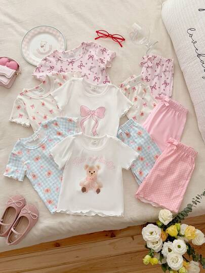 Babygirl A Ten-Piece Summer Multi-Color Round-Neck Short-Sleeved T-Shirt And Shorts Set, Featuring A Variety Of Patterns Such As Cartoon Bears, Polka Dots, Bows, And Checks, With A Soft, Cute, And Playful Style That Is Also Full Of Versatile Textures. Comfortable, Sweet, Cute And Adorable, Made Of Knitted Fabric With A Loose Fit, It Is Suitable For Vacation Travel, School Study, Home Relaxation, Birthday Parties, Outdoor Sports, Etc