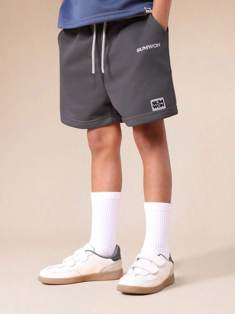 Pantaloncini in jersey con coulisse e logo