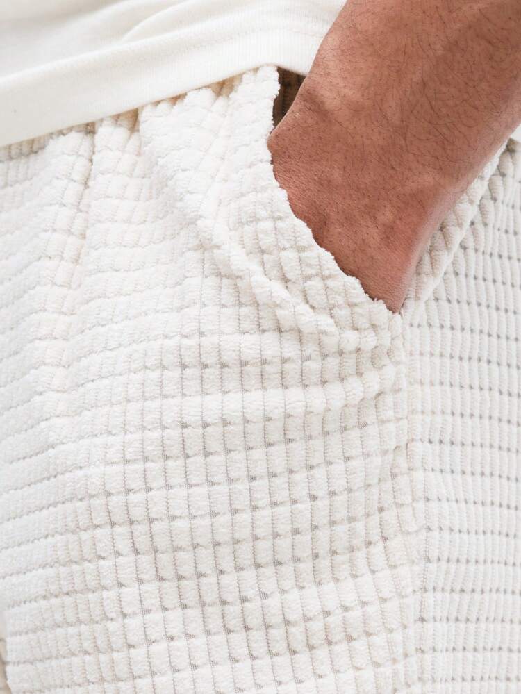 와플 니트 소재의 허리끈 조절형 반바지 (주머니 포함)