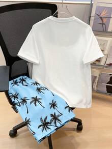 SHEIN 2件套青少年男童休闲短袖短裤套装，街头朋克摇滚校园风日常、派对、音乐节穿搭，适合春夏穿着，椰树印花沙滩短裤，热带风情 - 淺藍色 - 查看 2