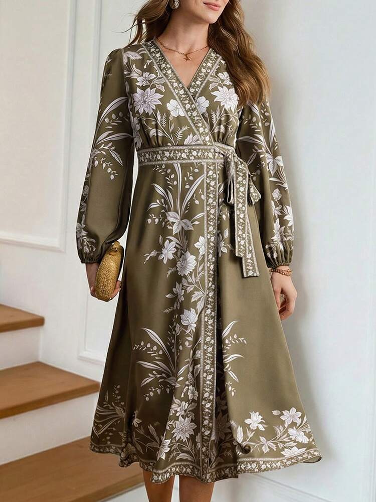 This Elegant Women's Dress Features A Floral Pattern On An Olive Green Base, Adorned With White Floral Designs, Exuding A Retro And Sophisticated Yet Fresh Style. The V-Neck Wrap-Style Design With A Belted Waist And Puff Sleeves Flatters The Figure While Maintaining An Elegant Feel. The Sophisticated Olive Green Color Is Suitable For Layering In Autumn And Winter Or Wearing Alone In Spring And Summer. Suitable For Both Spring And Autumn, It Can Be Accessorized With Jewelry To Brighten The Festive Atmosphere During The New Year. Perfect For Young People's Gatherings And Casual Occasions, This Dress Showcases Fashionable Taste At Small Gatherings With Its Retro Floral Pattern, And Is Also Easily Versatile For Work Or As An Outer Layer. It's A Versatile Piece In Your New Year's Wardrobe That Combines Quality And Style.