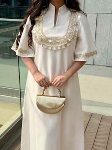 Al Najma Women's Tassel Design V-Neck Short Sleeve Loose Elegant Arabic Dress - Apricot - View 1