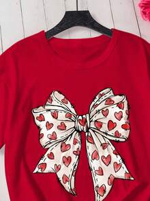 少女红色圆领短袖印花T恤，休闲舒适时尚百搭，卡通蝴蝶结和爱心印花短袖T恤，适合日常穿着、上学、外出、情人节等场合。 - 紅色 - 查看 4