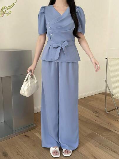 SHEIN Teen Girls Blue Knitted Sample Casual Retro,2pcs Set Asymmetrical Puff Sleeve V-Neck Blouse With Belt And Flare Pants,Elegant For Commuting, Suitable For Spring And Summer, For Parties, Clean Girl Blue Two Piece Set Two Piece Pants Set Casual Two Piece Set Two Piece Set Blue Pants Set