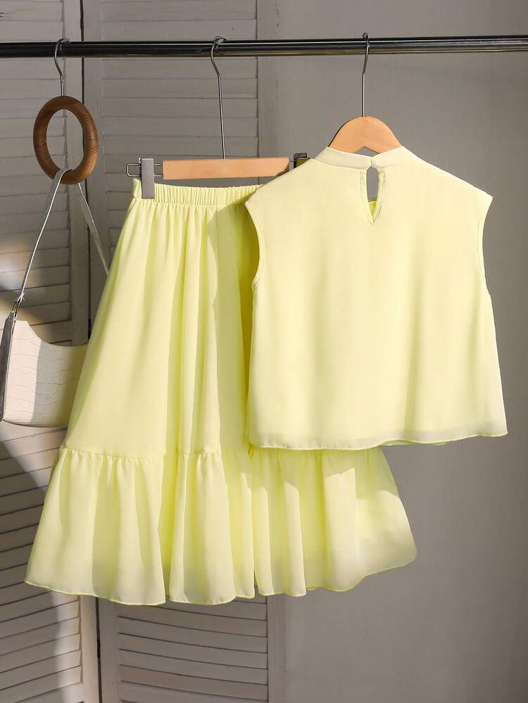 This Is A Set Consisting Of Two Items For Girls: A Short A-Line Vest With A Standing Collar And No Sleeves, Featuring Three-Dimensional Floral Decorations On The Front, And A Loose A-Line Skirt With An Elastic Waistband. This Sweet And Feminine Two Pieces Set Is Perfect For Summer. - Yellow - View 2