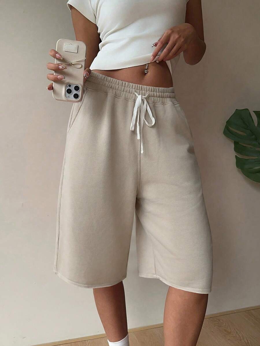 SHEIN EZwear Pantalones cortos informales de talla grande para mujer en color albaricoque con cordón en la cintura y bolsillos laterales - Albaricoque - Ver 1