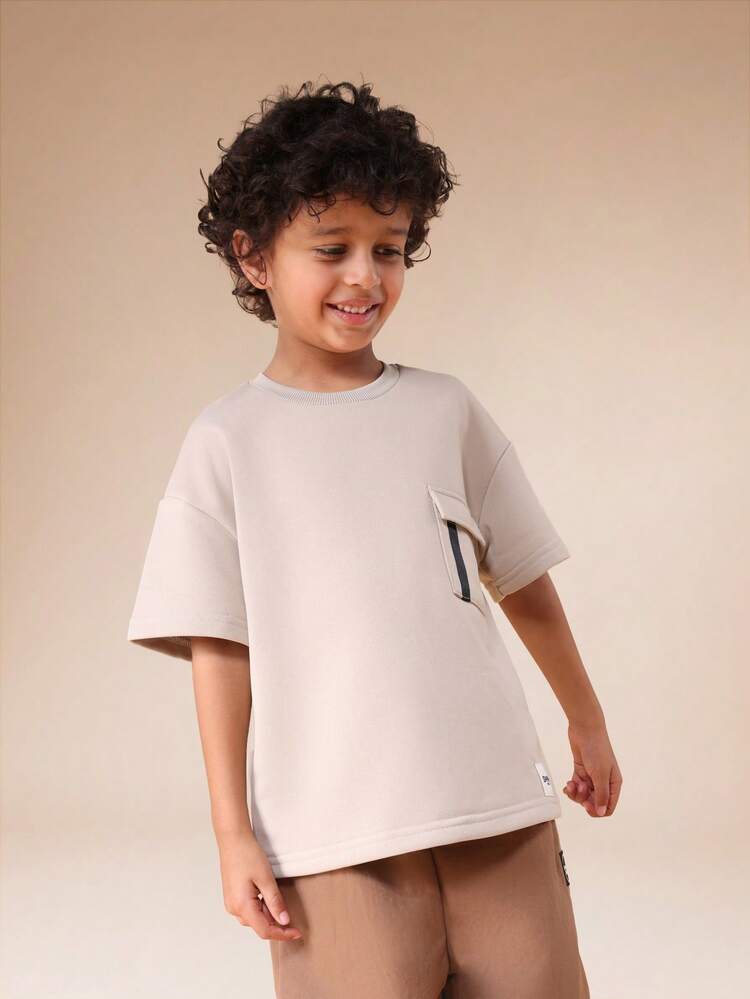 Maglietta oversize con tasca sul petto
