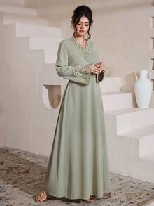 Al Najma Solid Color Applique Tie-Up Cinched Waist Elegant Flared Dress For Women - Green - View 6