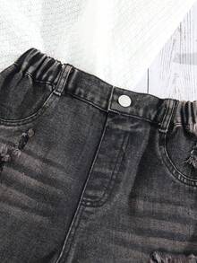 少女破洞牛仔短裤，轻盈夏季新品，水洗黑色，街头时尚，休闲百搭，个性设计，简约百搭，毛边裤脚，松紧腰带，舒适棉质牛仔面料，适合日常、派对、上学、通勤等各种场合，春夏新款 - 黑色 - 查看 5