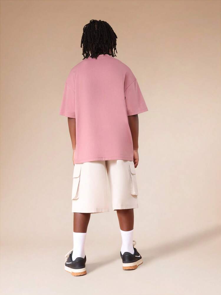 Conjunto de camiseta y pantalones cortos cargo en tonos pastel