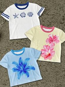 Attitoon 3件套女士紧身撞色T恤，黄色、粉色和蓝色背景上印有热带花卉、贝壳和百合花图案，适合夏季穿着 - 彩色 - 查看 12