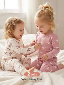 Cozy Pixies 4 pezzi Set pigiama da bambina con maglietta a girocollo in maglia morbida con cuori e fiocchi, e leggings in vita elastica, aderente - Rosa - Visualizzare 10