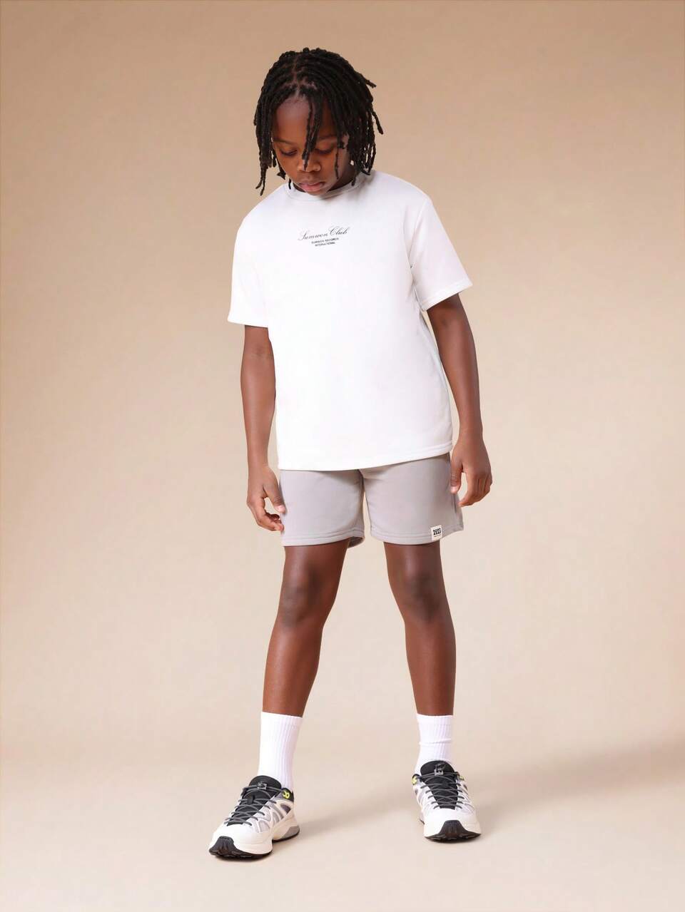 Set di t-shirt e pantaloncini con stampa scritta