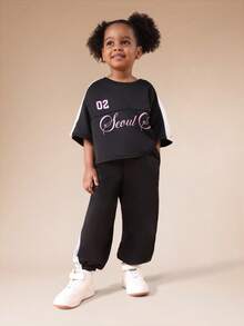 SUMWON Girls Oversized Seoul Graphic Color Block Short Sleeve T-Shirt And Wide Leg Jogger Pants Two Piece Set Casual Vacation - Black - View 1