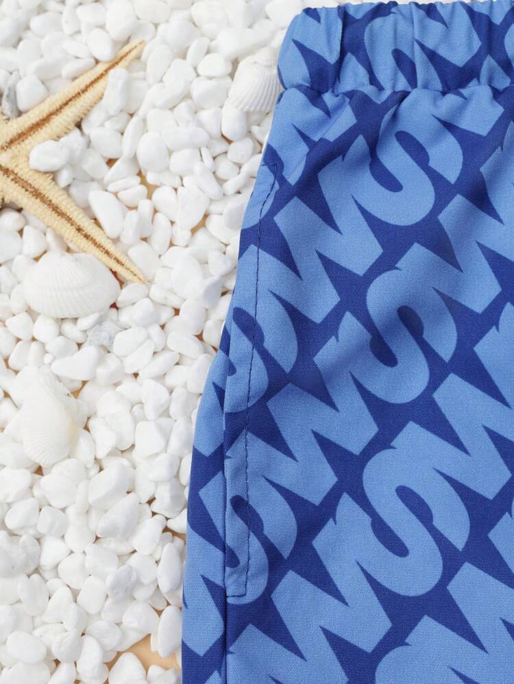 Calções de banho com estampa de monograma e cordão ajustável.