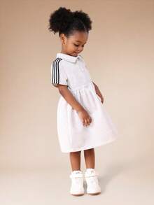 SUMWON Robe courte style polo pour filles avec col, manches courtes et détails de rayures sur les côtés. Coupe évasée pour un confort et une décontraction quotidiens. Idéale pour les vacances - Gris pâle - Voir 6
