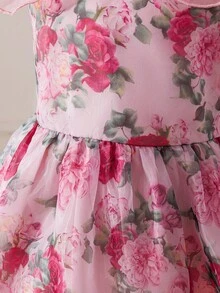 Menina jovem com um glamoroso vestido midi de organza com um grande laço nas costas. - Rosa - Ver 10