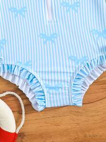 1 bộ áo tắm liền thân dài tay cho bé gái, có khóa kéo, nơ xinh xắn và họa tiết hoa, kèm mũ. - Xanh và trắng - Xem 5