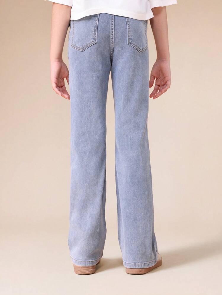 Strassbesetzte Jeans mit weitem Bein und Perlennieten