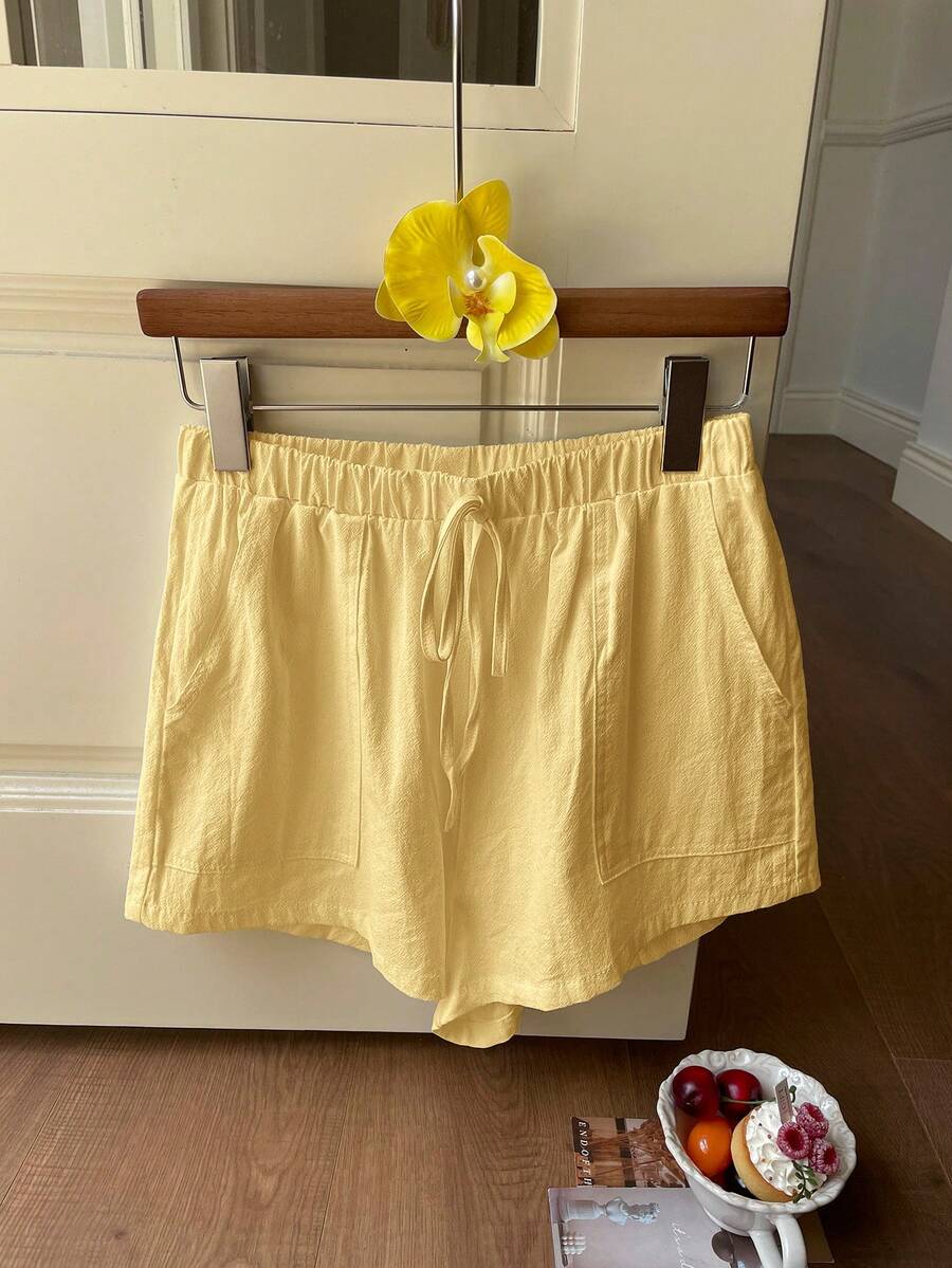 SHEIN EZwear 夏季宽松休闲白色系带斜插口袋棉质弹力腰短裤 夏季短裤 黄色短裤 纸袋短裤 纸袋短裤 亚麻短裤 奶油黄短裤 女士亚麻短裤 女士亚麻短裤 - 黃色 - 查看 1