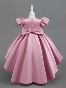 Glamorique Kids 粉色缎面女童连衣裙，饰有闪亮的泡泡袖、前短后长的拖尾，以及精致的花卉装饰，尽显公主风范，适合儿童花童角色、婚礼庆典和生日派对穿着。 - 乾枯玫瑰色 - 查看 2