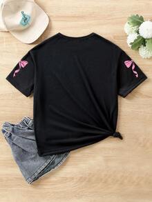 SHEIN T-shirt court décontracté de base pour filles préadolescentes, avec imprimé graphique de numéro 67, nœud en dentelle et slogan. Confortable pour le port quotidien, styles cosy pour l'été et l'automne, convient pour le printemps, l'été et l'automne - Noir - Voir 2