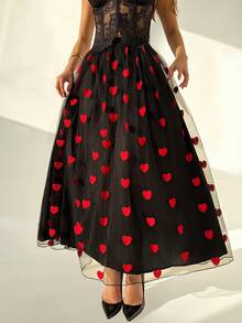 RiviMae 这款女士中长裙采用松紧腰设计，搭配心形网纱面料，饰有心形元素，充满情人节气息，时尚优雅，适合日常穿着、婚礼、宴会、通勤、毕业派对、节日活动、度假、约会、聚会、万圣节、圣诞节、新年和感恩节等场合。 - 黑色 - 查看 3