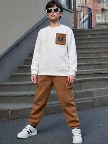 1. 男童休闲针织纹理圆领卫衣和抽绳工装口袋裤运动套装，Y2K风格，适合春夏、郊游、情人节、约会、旅行、度假、家庭聚会、返校、婚礼、正式活动、运动、生日派对等场合 - 彩色 - 查看 2