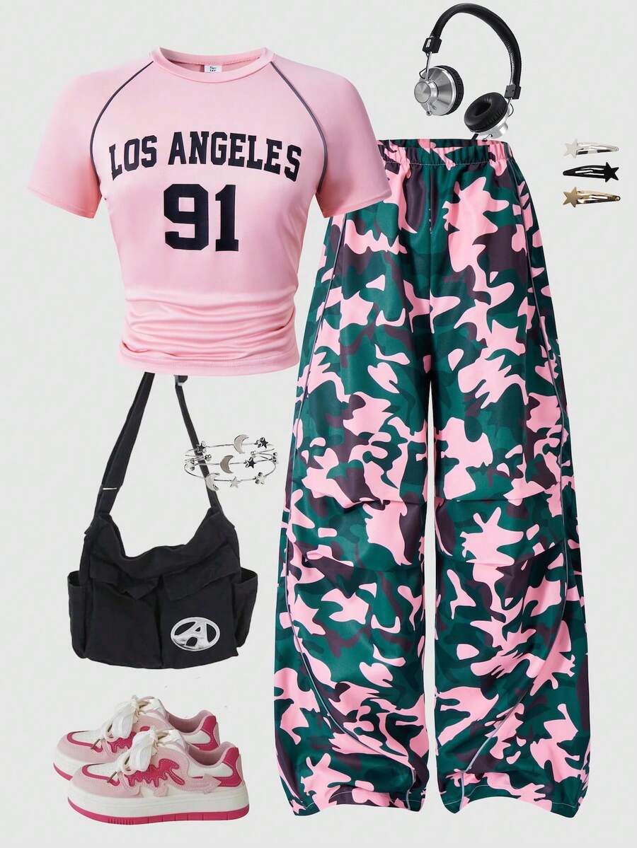 SHEIN 这款两件套青少年女童套装包含休闲百搭的T恤和宽松长裤。T恤正面印有英文和数字图案，并配有反光条。非常适合散步、购物、学校郊游和日常休闲穿着。可搭配外套或马甲。 - 粉色 - 查看 1