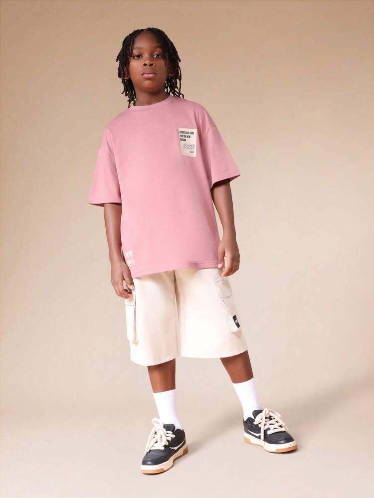 Conjunto de camiseta y pantalones cortos cargo en tonos pastel