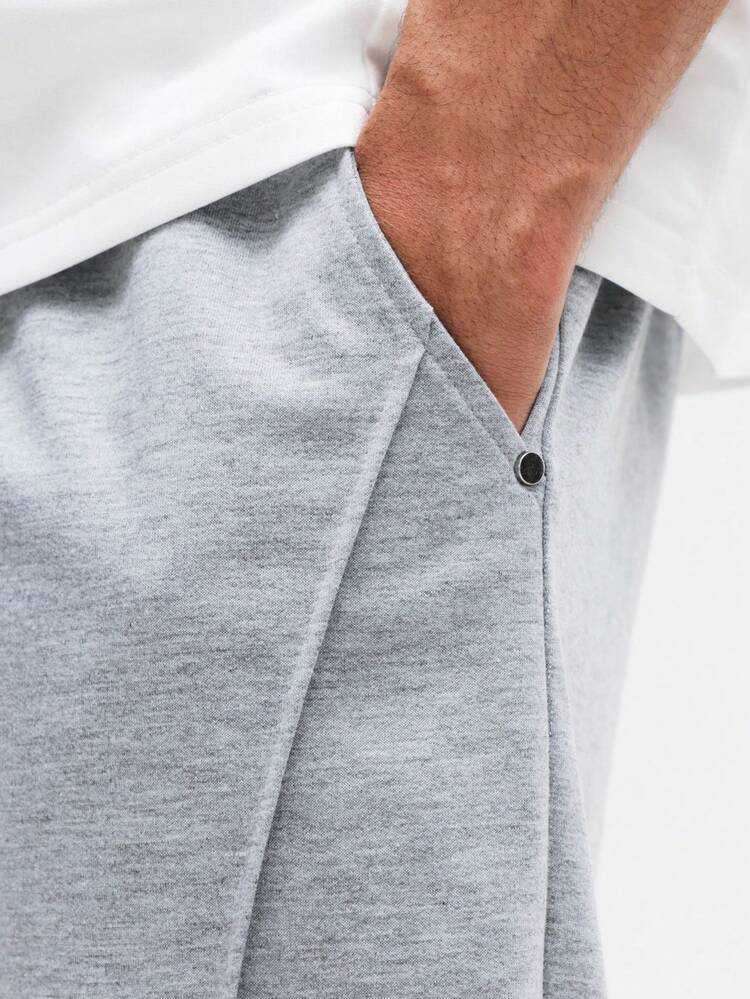 Pantalon de survêtement à cordon de serrage et poches latérales