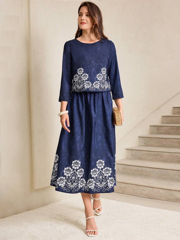This Elegant Two-Piece Set For Women Is Perfect For Spring And Summer. The Deep Navy Blue Base Is Adorned With White Floral Faux Embroidery, Creating A Classic Color Contrast That Exudes Understated Elegance. The Floral Pattern Features A Vintage Faux Embroidery Design, Adding A Touch Of Understated Luxury. The Set Includes A Loose-Fitting Top And A Full-Skirted Flared Skirt. The Mid-Length Sleeves Are Perfect For Spring And Autumn, While The Flowing Skirt Adds An Elegant Layer. Suitable For Casual Gatherings Or Everyday Outings, This Set Conveys A Sophisticated Style With Its Navy Blue Base And Showcases A Retro-Chic Look With Its Faux Embroidery Details. It's A Beautiful And Practical Choice For Any Season.