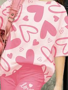 SHEIN 两件套时尚爱心印花休闲短袖T恤和短裤套装，适合年轻女孩，四季皆宜