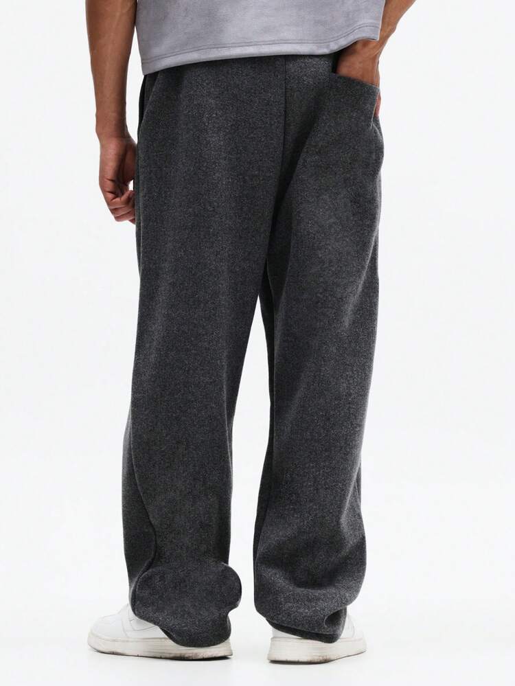 Męskie spodnie dresowe z szerokimi nogawkami, plisowane, ze ściągaczem w pasie, luźne, w stylu streetwear