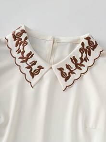 GlowEve ملابس علوية نسائية بأكمام قصيرة مطرزة على الياقة، أنيقة للارتداء اليومي والعمل والعطلات، لون المشمش، أكمام قصيرة مناسبة للربيع المبكر والخريف - لون مشمشي - مشاهدة 4