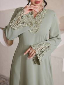 Al Najma Solid Color Applique Tie-Up Cinched Waist Elegant Flared Dress For Women - Green - View 4