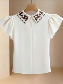 GlowEve ملابس علوية نسائية بأكمام قصيرة مطرزة على الياقة، أنيقة للارتداء اليومي والعمل والعطلات، لون المشمش، أكمام قصيرة مناسبة للربيع المبكر والخريف - لون مشمشي - مشاهدة 2