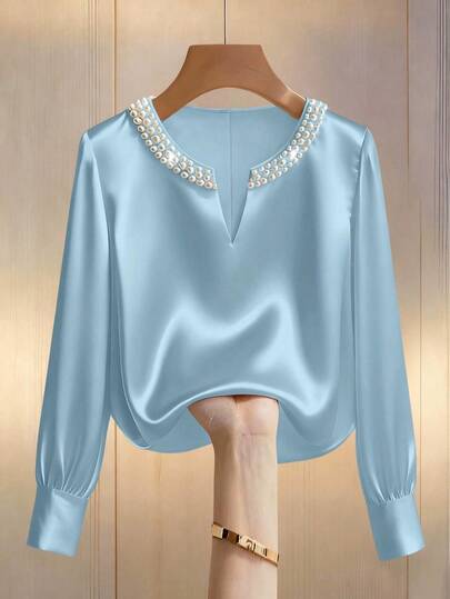Franclia بلوزة نسائية أنيقة بياقة على شكل حرف V مزينة باللؤلؤ وأكمام طويلة، من قماش الساتان، مناسبة للارتداء اليومي والذهاب إلى العمل
